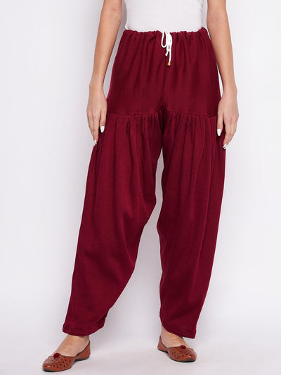 Maroon solid woolen salwar for women, lightweight and comfortable.
