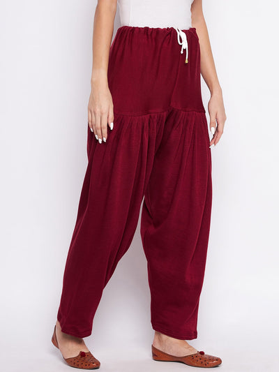 Maroon solid woolen salwar for women from Clora, comfortable and lightweight.