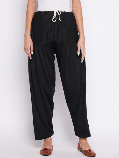 Black solid woolen salwar for women, comfortable and lightweight design.