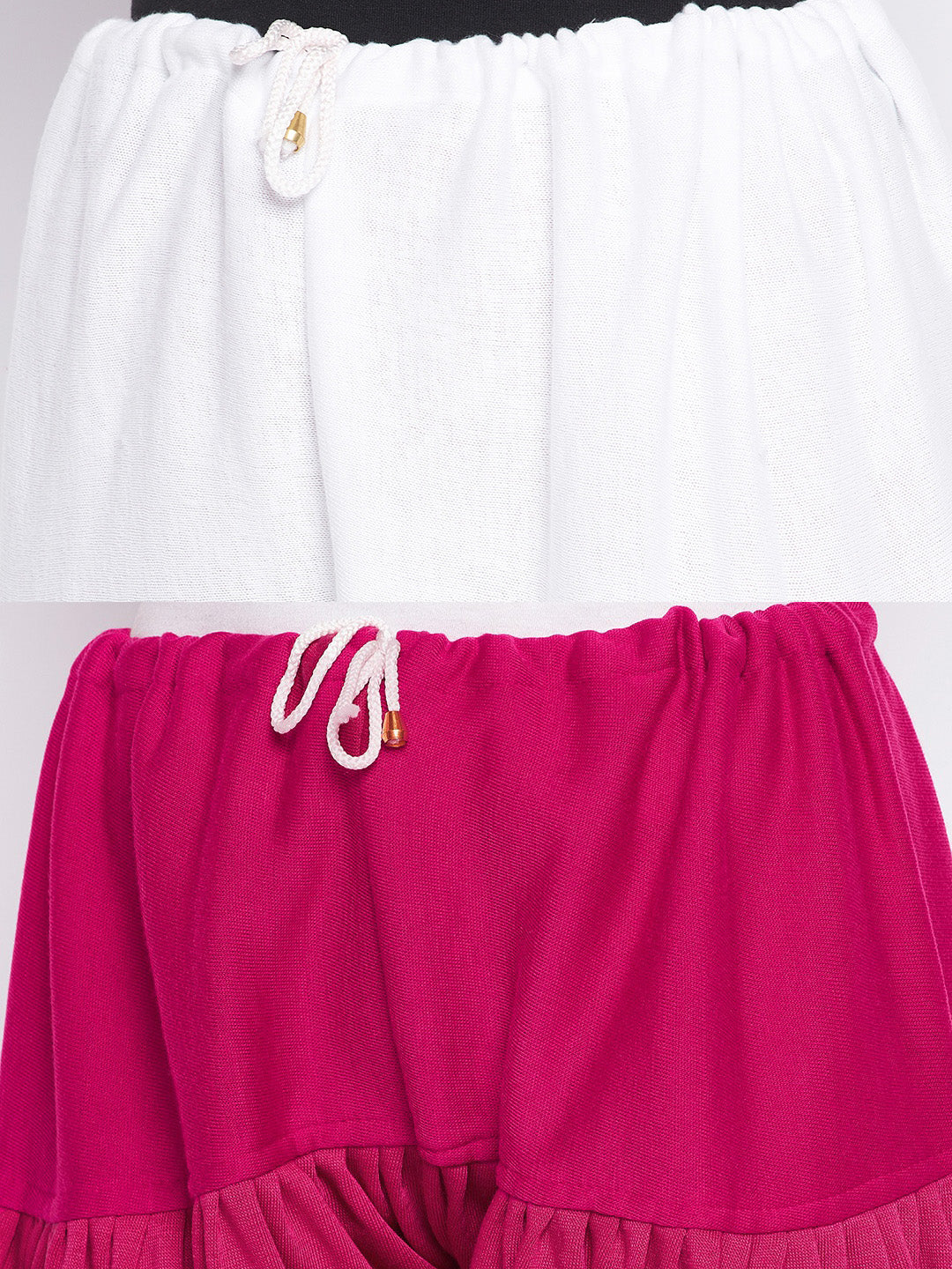 White and magenta solid woolen salwar pack of 2 by Clora, showcasing fabric detail.