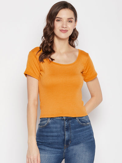 Mustard solid regular fit crop top with round neck and cap sleeves.