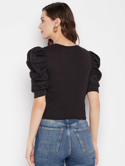 Black solid puff sleeves crop top with tie knot collar, shown from the back, casual wear.