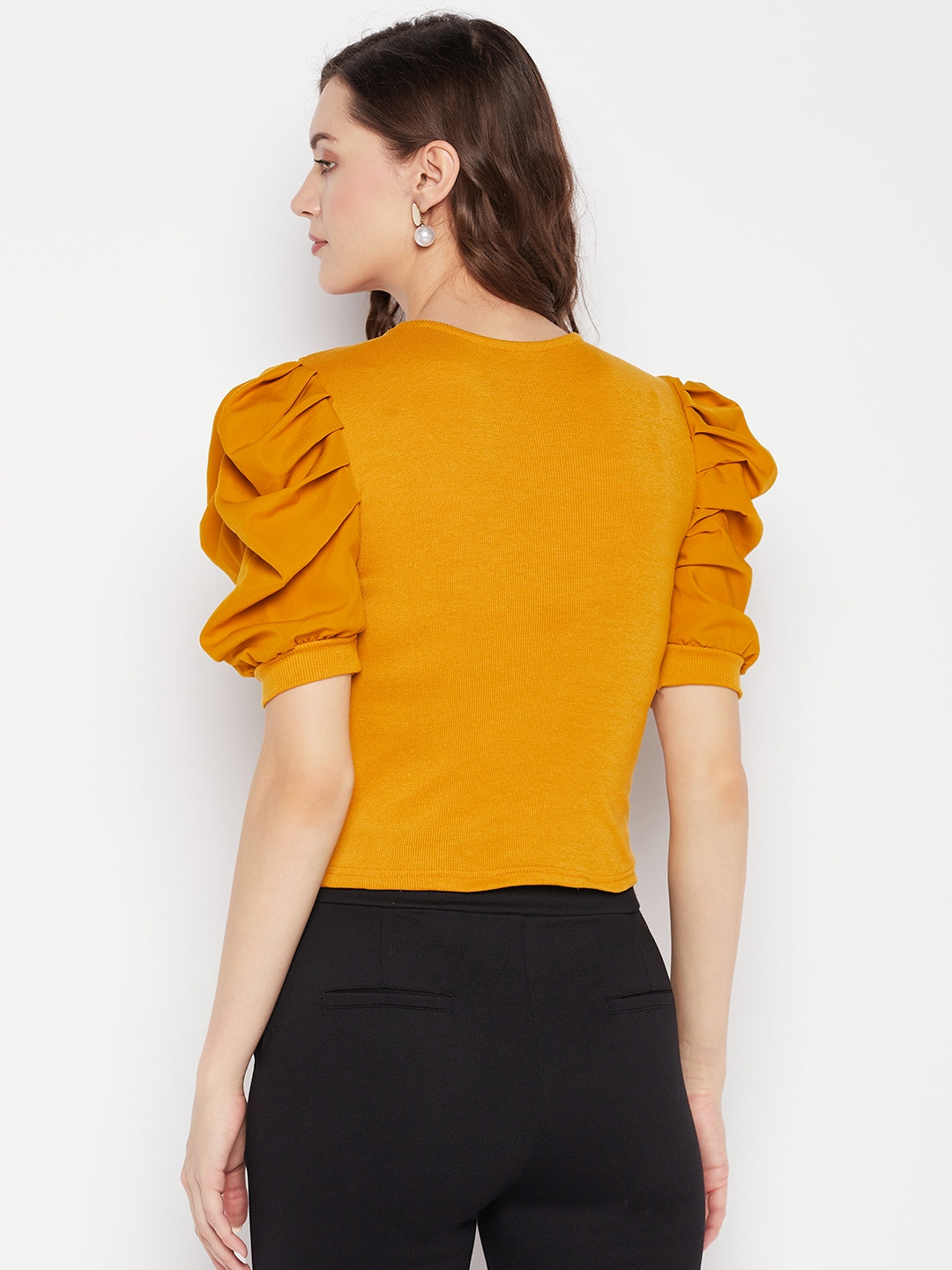 Mustard solid puff sleeves crop top with tie knot collar and knitted design.