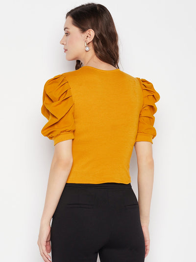 Mustard solid puff sleeves crop top with tie knot collar and knitted design.