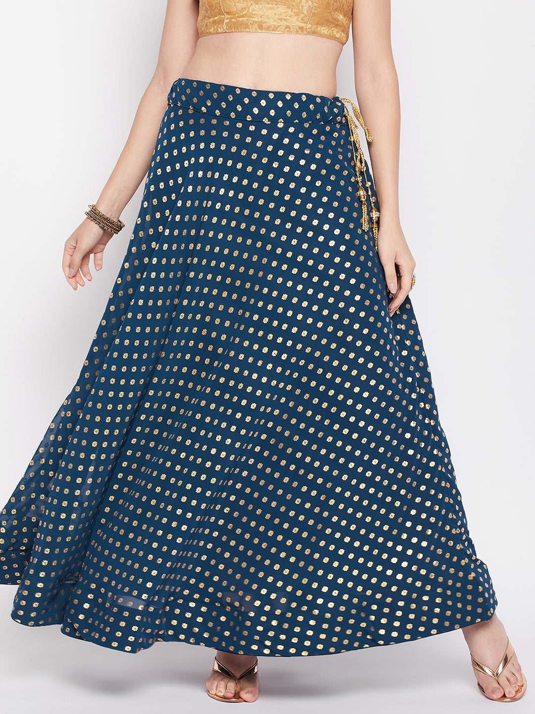 Peacock blue foil printed georgette flared skirt with drawstring closure.