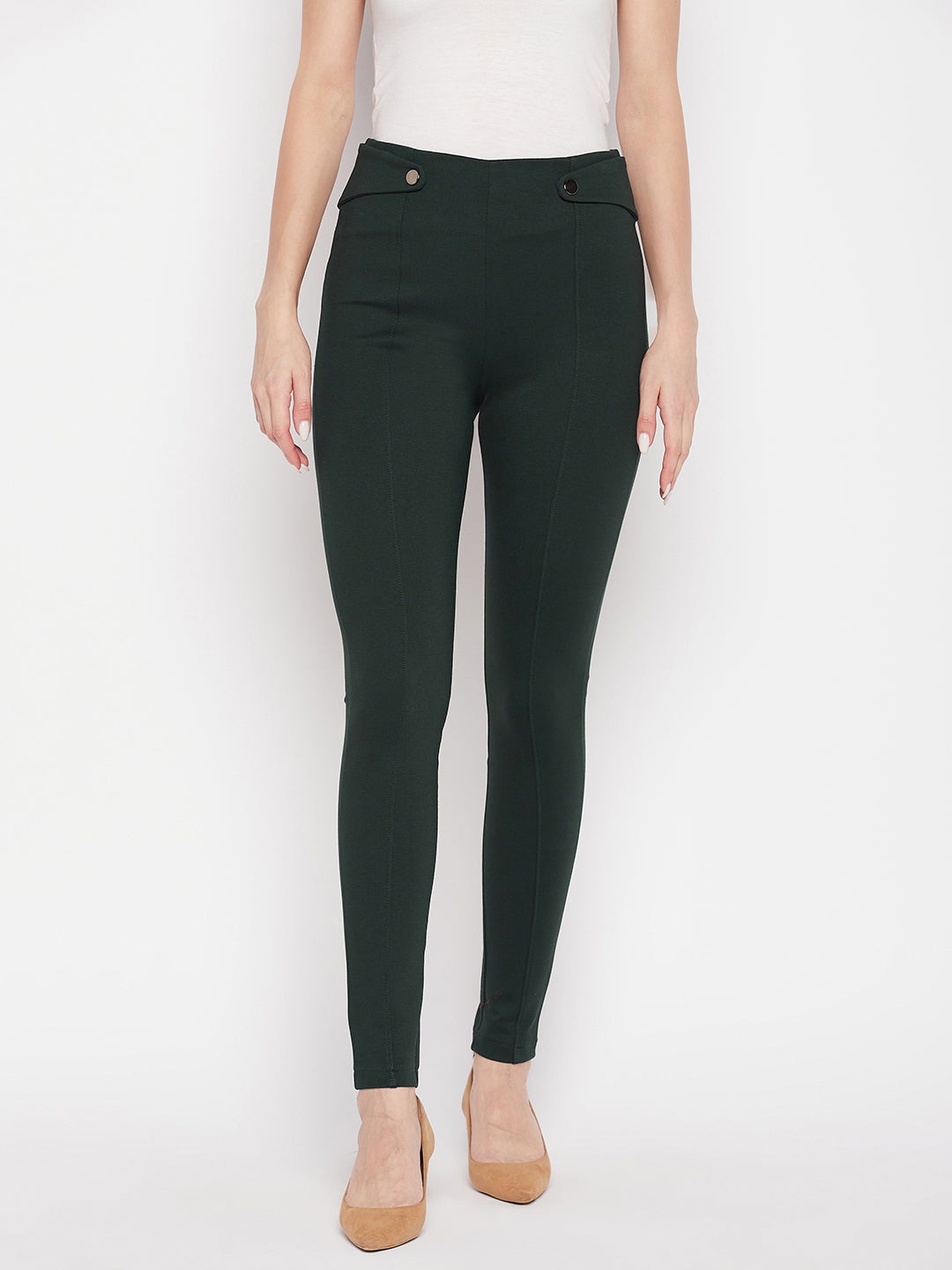 Bottle Green Solid Relaxed Fit Jeggings with elastic waistband and back pockets.