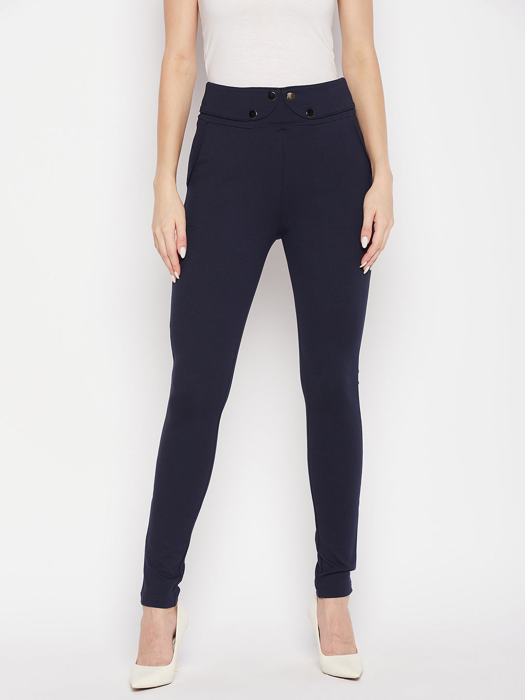 Navy blue solid relaxed fit jeggings with elasticated waistband and front pockets.