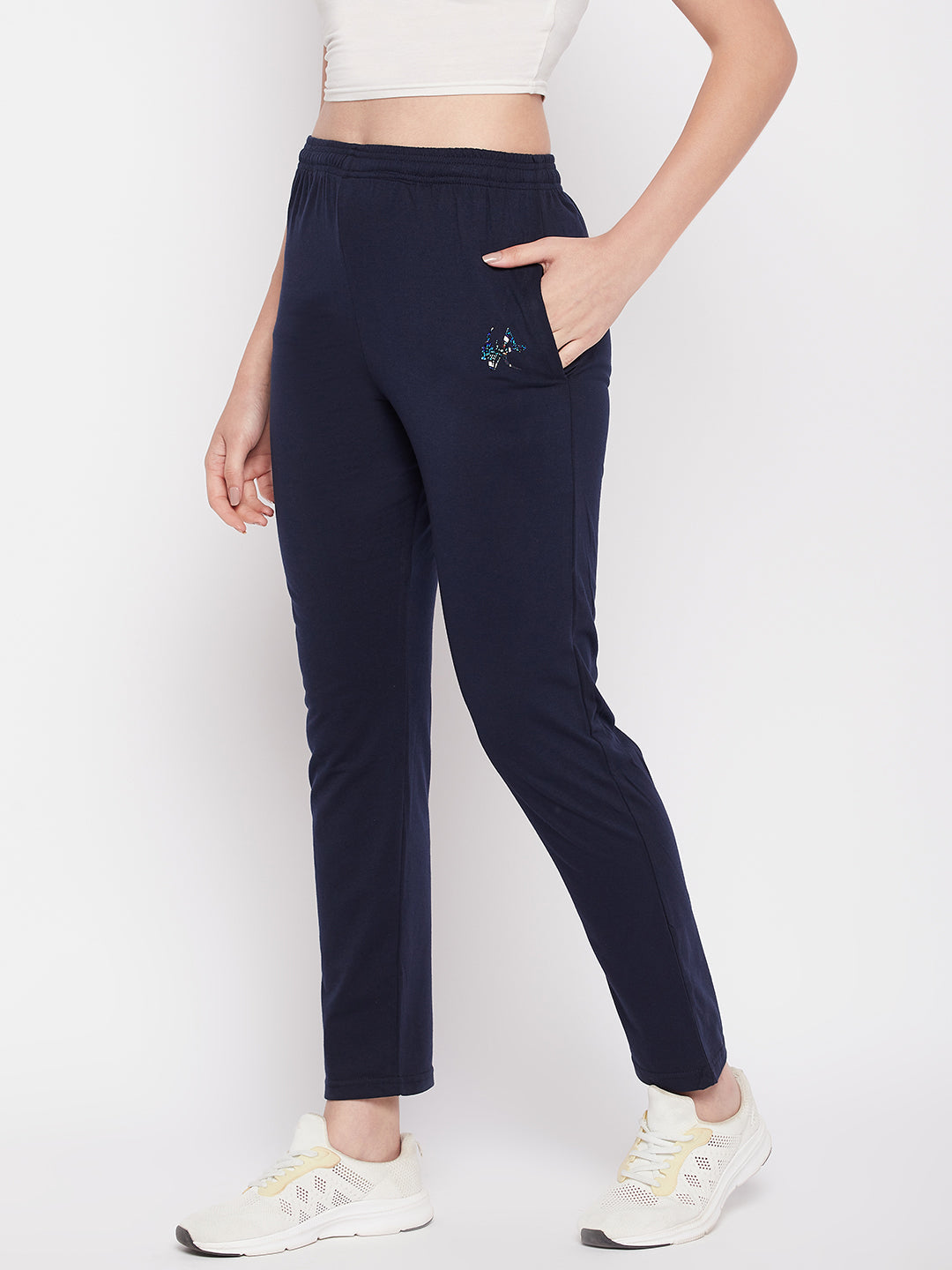 Navy blue solid mid rise cotton track pants with elasticated waistband and pockets.