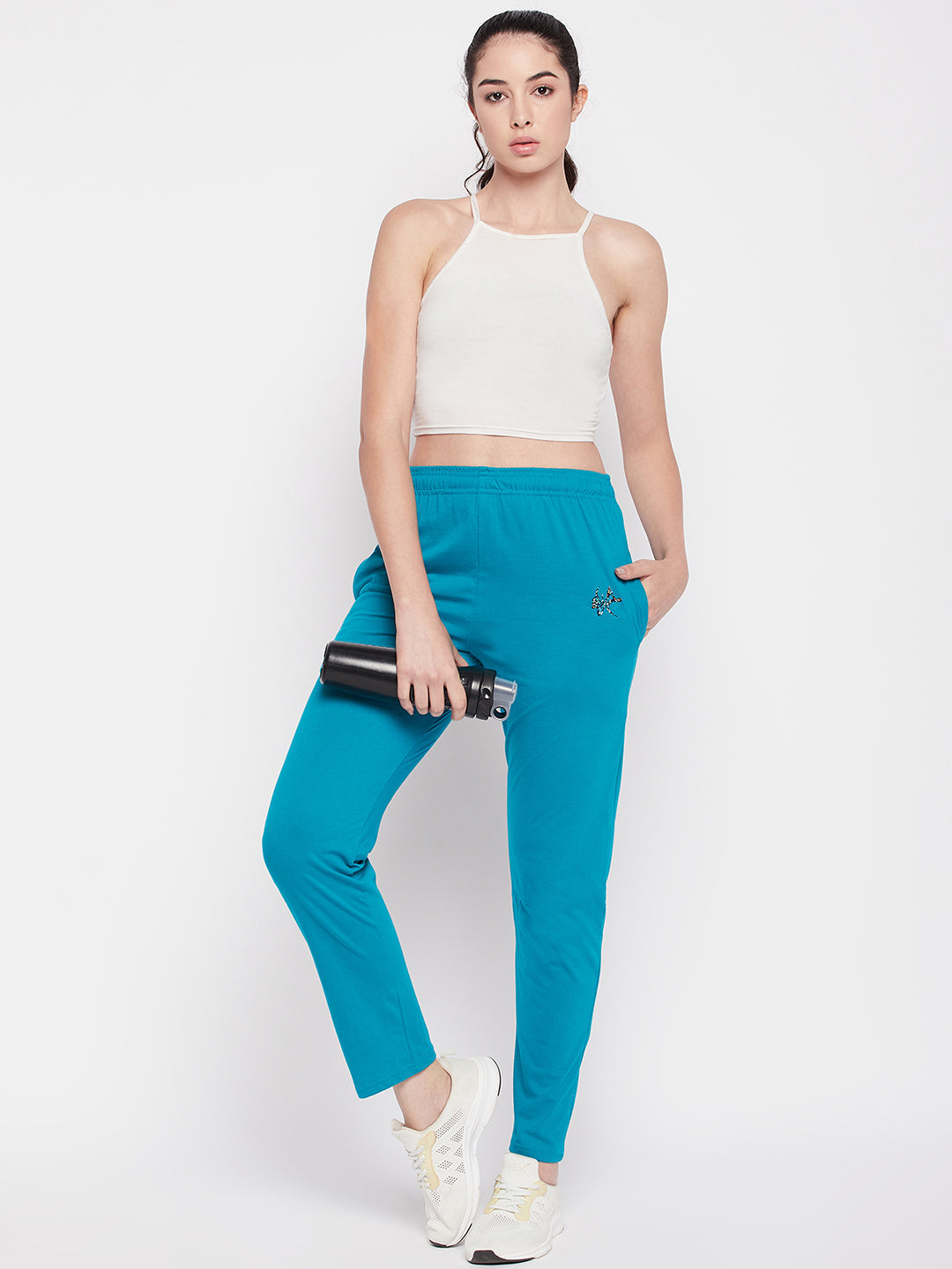 Rama Green Solid Mid Rise Cotton Track Pants with elasticated waistband and drawstring.