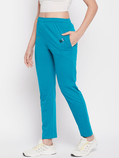 Rama Green Solid Mid Rise Cotton Track Pants with drawstring waist and pockets.