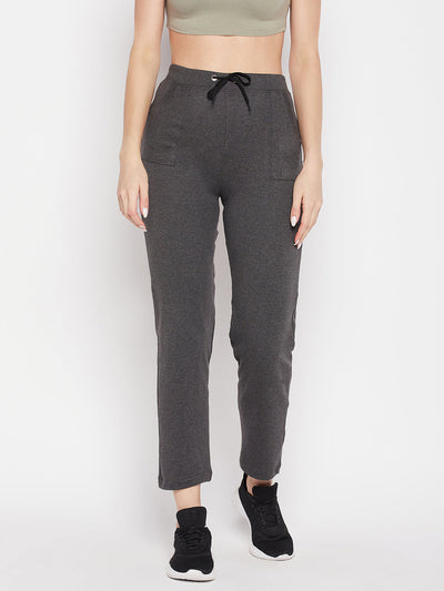 Dark grey solid mid-rise cotton trackpants with elasticated waistband and drawstring closure.