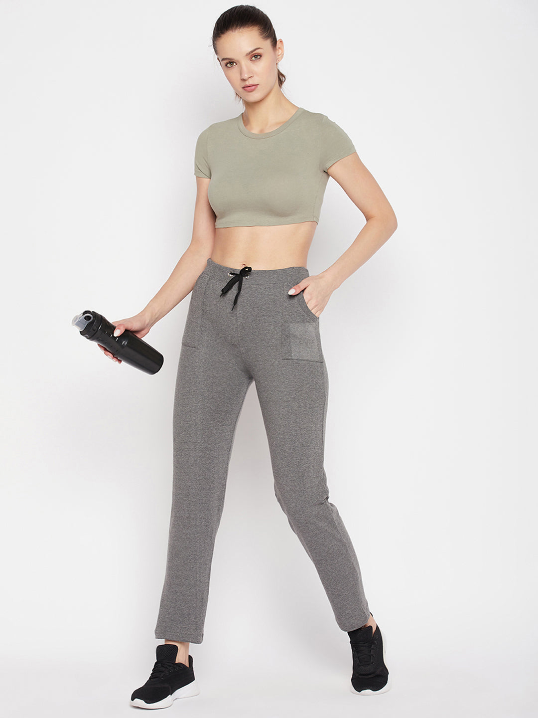 Light grey solid mid-rise cotton trackpants with elasticated waistband and drawstring.