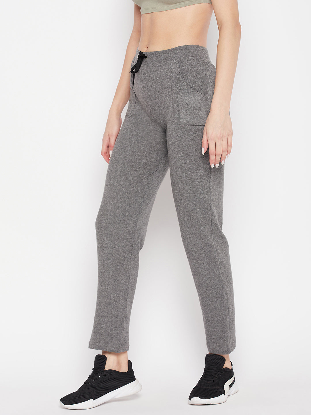 Light grey solid mid rise cotton trackpants with elasticated waistband and drawstring.