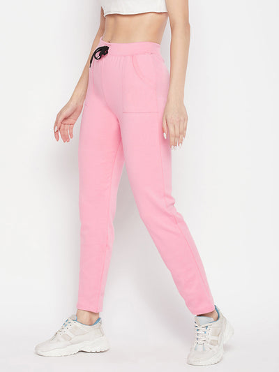 Baby pink mid-rise cotton trackpants with drawstring.