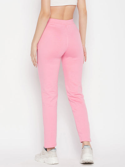 Baby Pink Solid Mid Rise Cotton Trackpants with elastic waistband and drawstring closure.