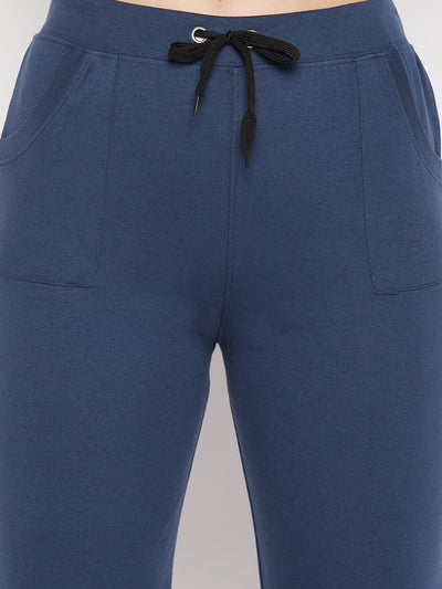 Aqua Blue Solid Mid Rise Cotton Trackpants with elastic waistband and drawstring.