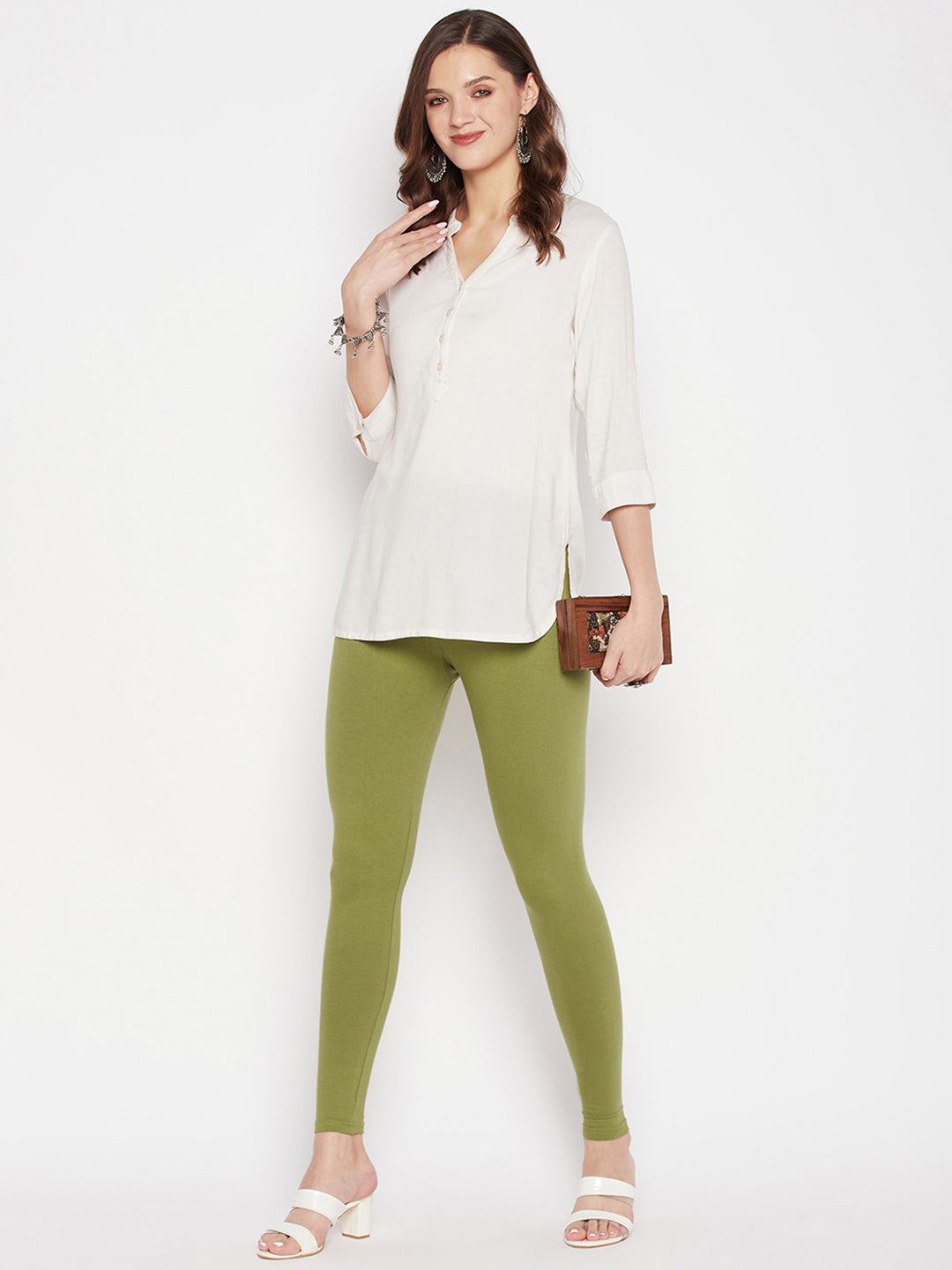 Olive solid ankle length leggings with elasticated waistband.