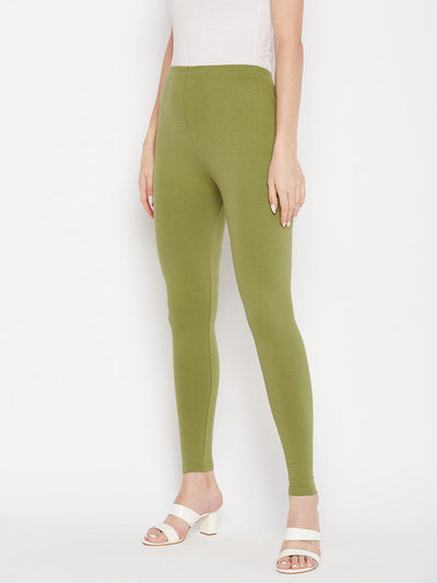 Olive solid ankle length leggings with elasticated waistband.