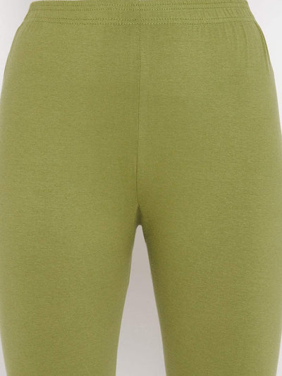 Olive solid ankle length leggings with elasticated waistband.