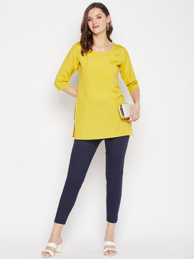 Navy blue solid cotton Lycra ankle-length pant with elasticated waistband.