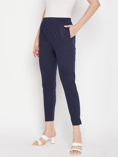 Navy Blue Solid Cotton Lycra Pant with elastic waistband and ankle length design.