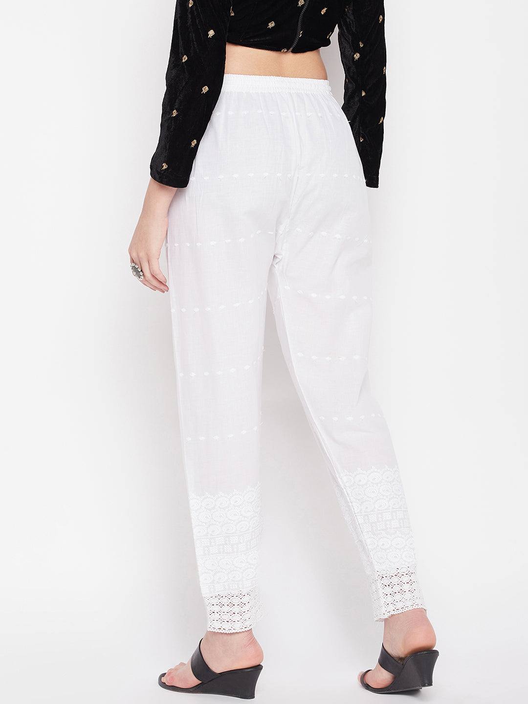 White embroidered chikankari cotton palazzo with elasticated waistband.