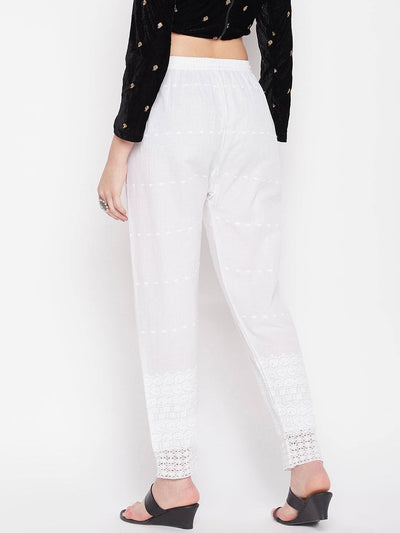 White embroidered chikankari cotton palazzo with elasticated waistband.