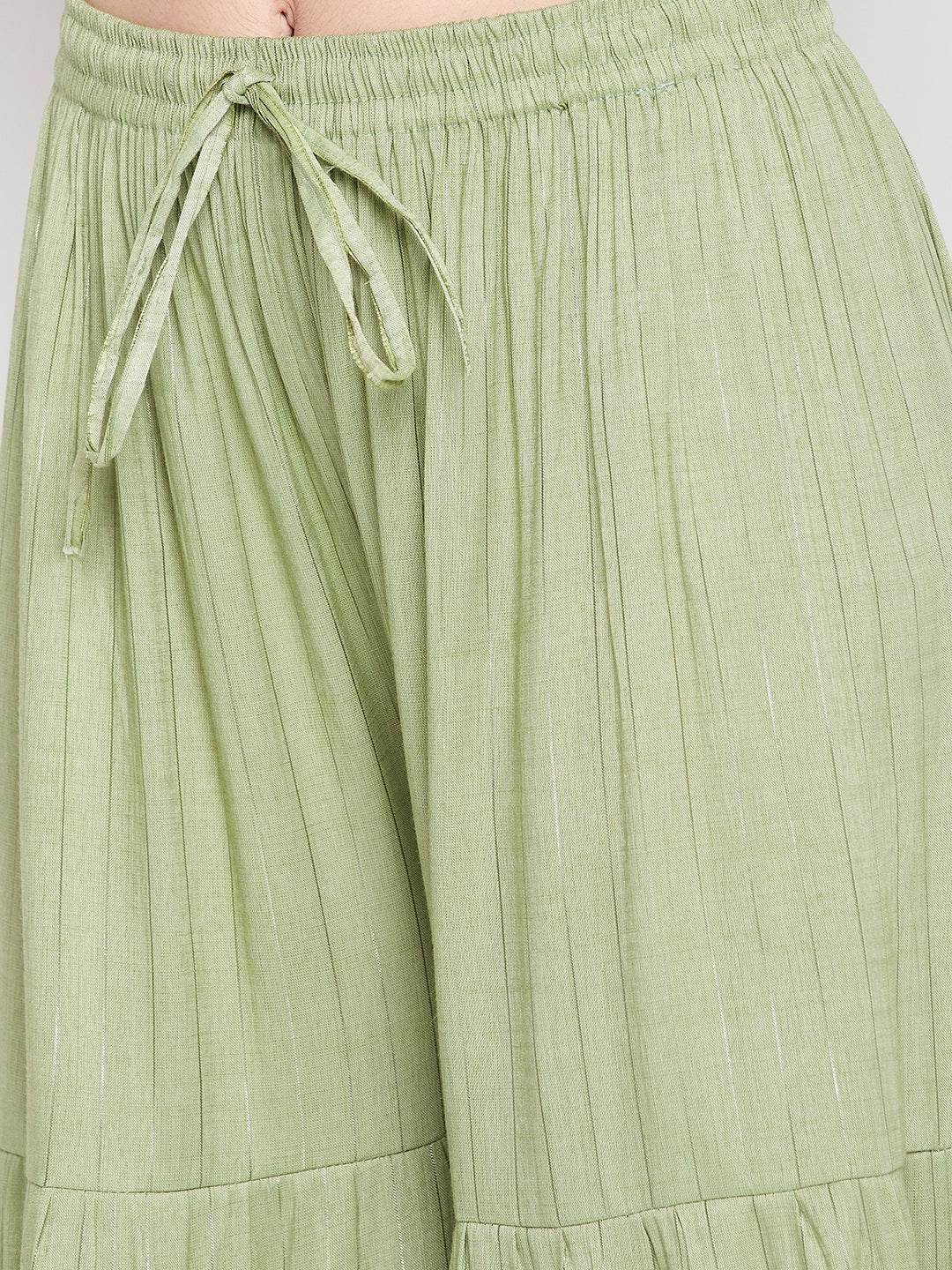 Pista Green Embellished Rayon Gharara with flared hem and elasticated waistband.