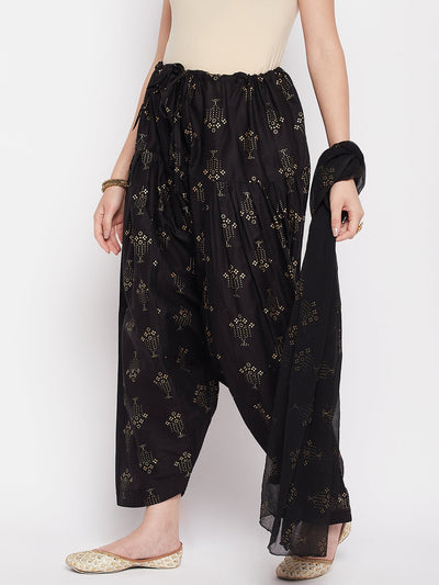 Black printed cotton salwar and dupatta with drawstring waistband.
