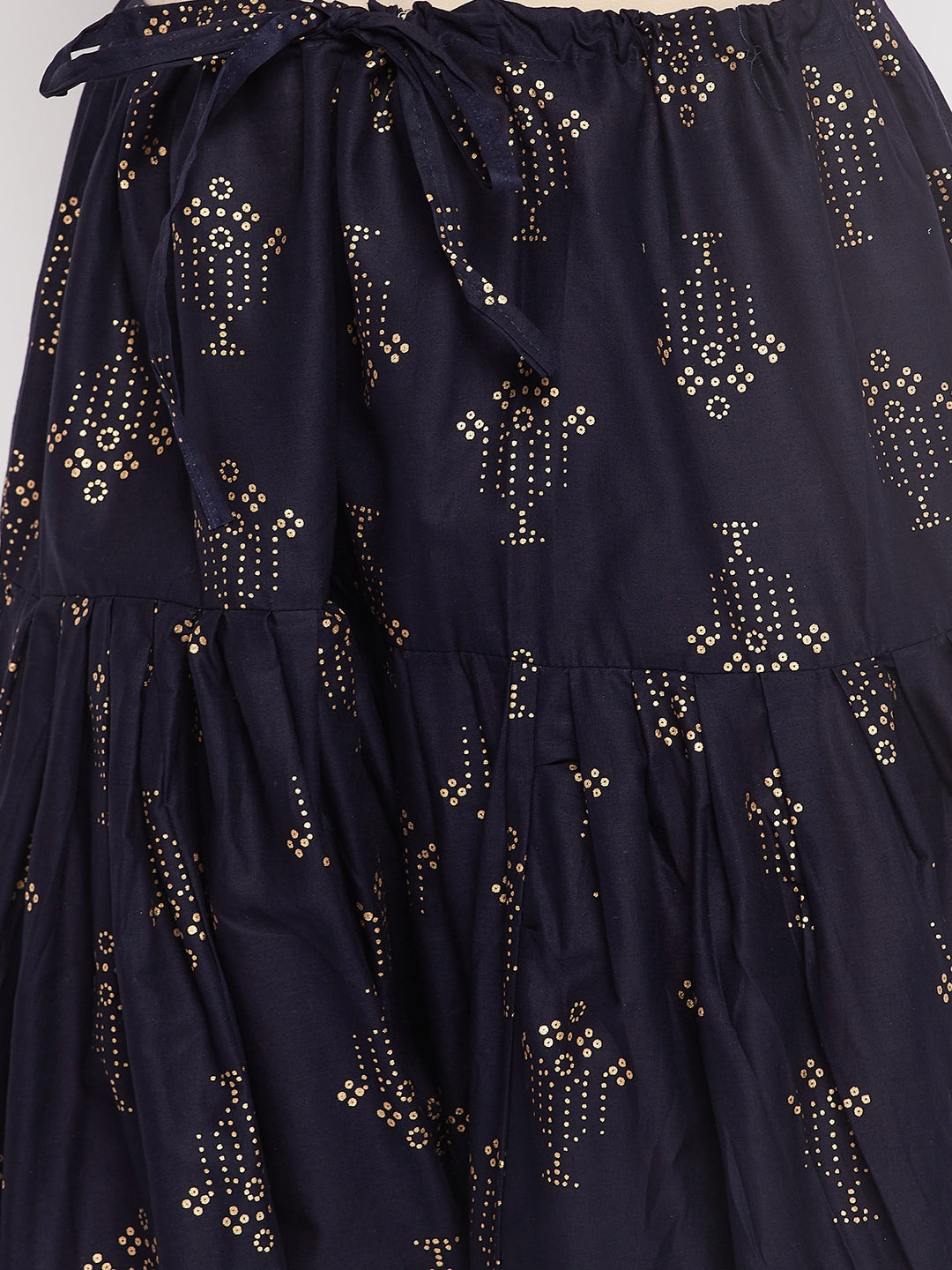Navy blue printed cotton salwar with gold accents and drawstring waistband.