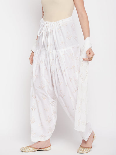 White printed cotton salwar with chiffon dupatta and drawstring waistband.