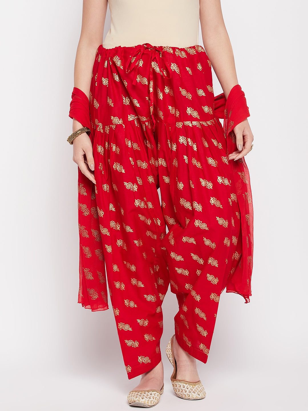 Red printed cotton salwar and chiffon dupatta with drawstring waistband.