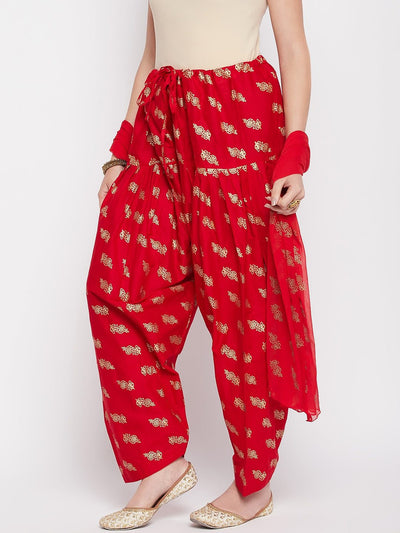Red printed cotton salwar with chiffon dupatta and drawstring waistband.