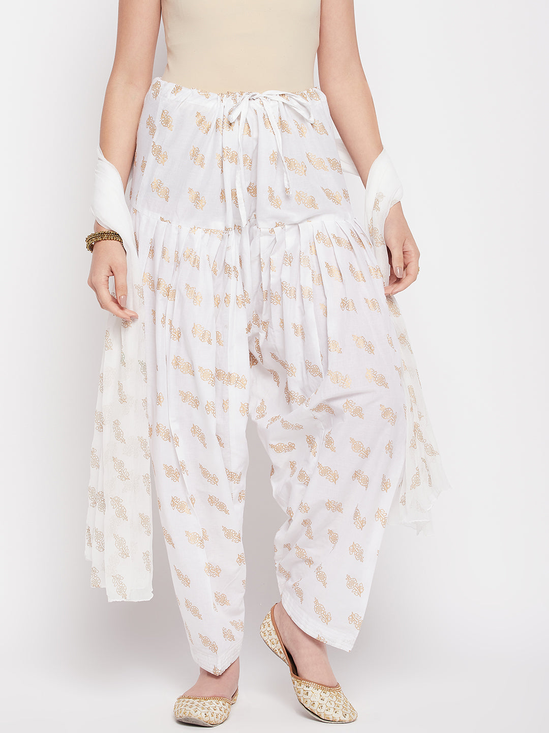 White printed cotton salwar with chiffon dupatta and drawstring waistband.