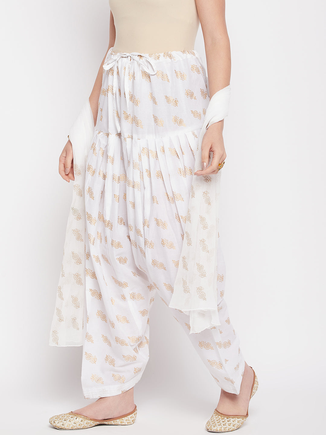 White printed cotton salwar with chiffon dupatta and drawstring waistband.
