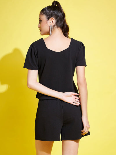 Black solid regular fit top with V-neck design and half sleeves.