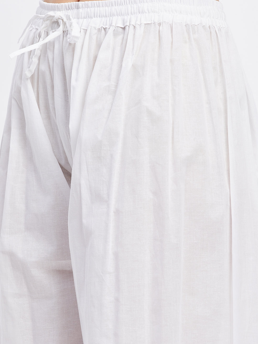 White embellished Afghani salwar with elasticated waistband and drawstring.