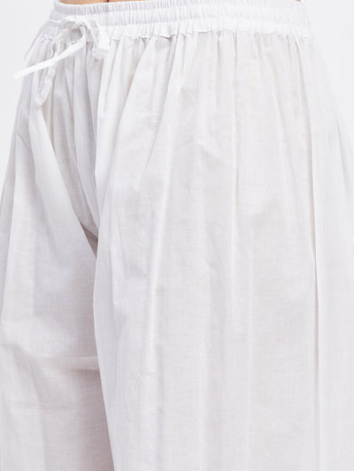 White embellished Afghani salwar with elasticated waistband and drawstring.
