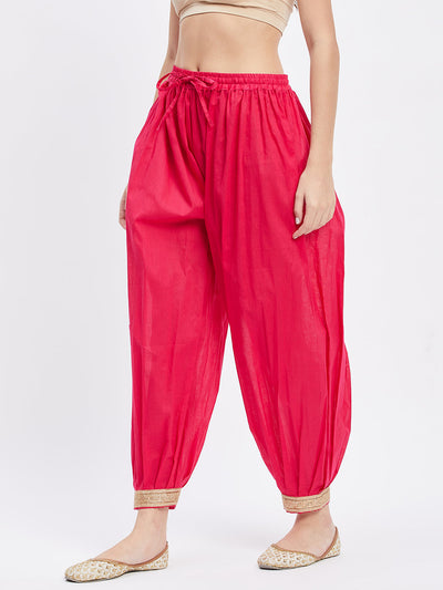 Magenta Embellished Afghani Salwar with elasticated waistband and drawstring.