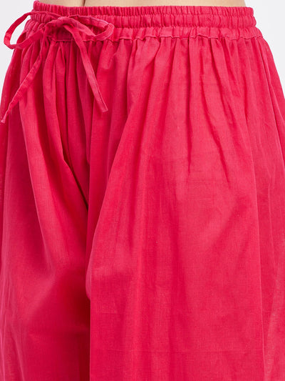 Magenta embellished Afghani salwar with elasticated waistband and drawstring.
