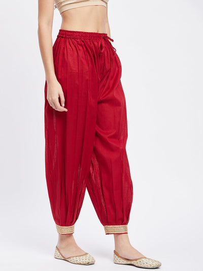 Maroon Embellished Afghani Salwar with elasticated waistband and drawstring.