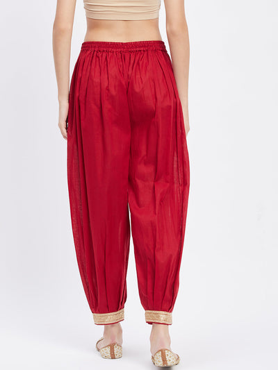 Maroon Embellished Afghani Salwar with elasticated waistband and drawstring.