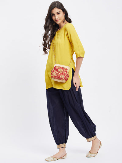 Navy blue embellished Afghani salwar with elasticated waistband and drawstring.