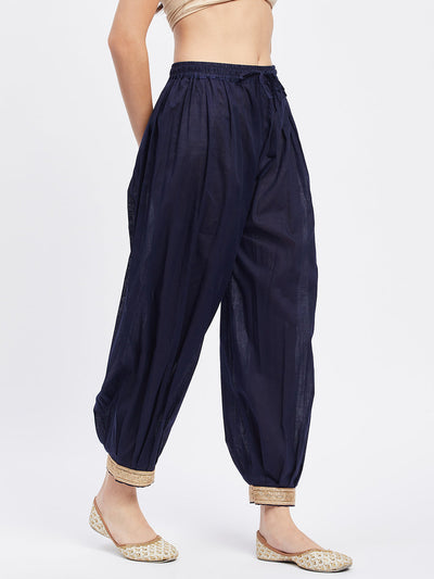 Navy Blue Embellished Afghani Salwar with elasticated waistband and embellished hemline.