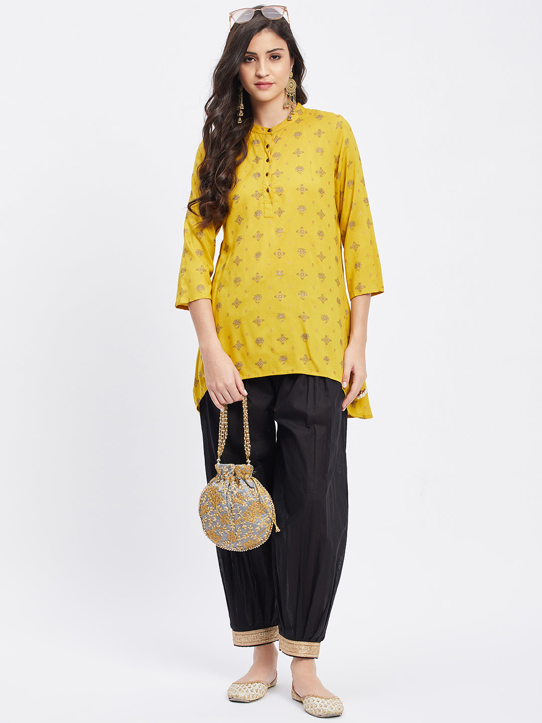 Black Embellished Afghani Salwar with elasticated waistband and drawstring.