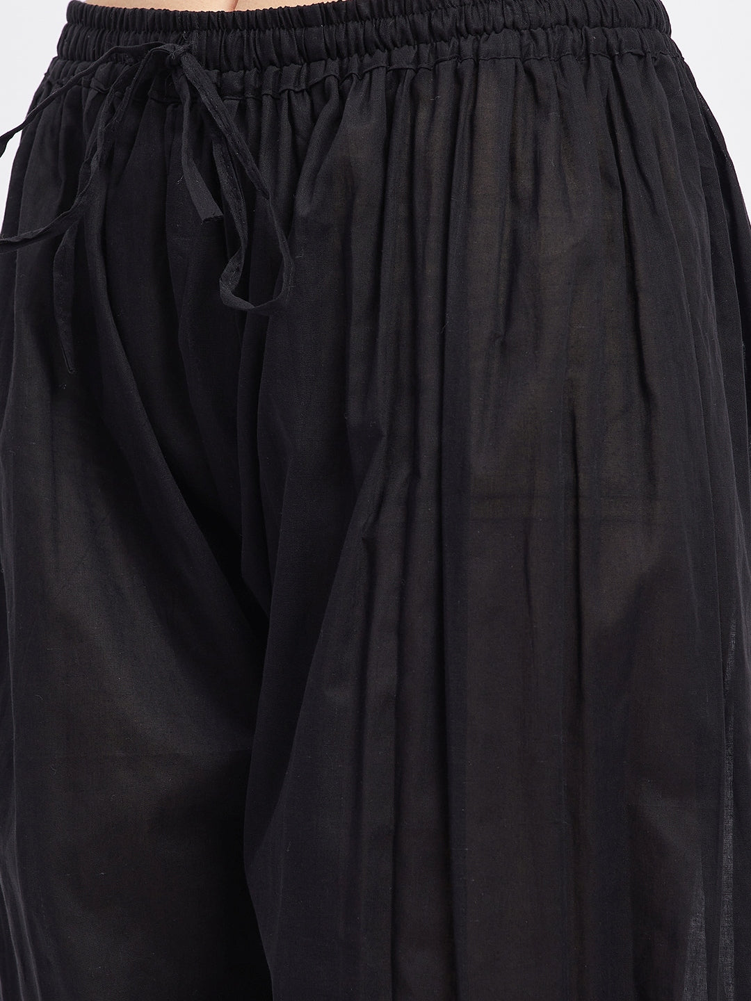 Black embellished Afghani salwar with elasticated waistband and drawstring, featuring embellished hemline.