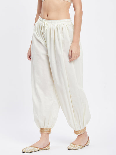 Cream Embellished Afghani Salwar with elastic waistband and drawstring.