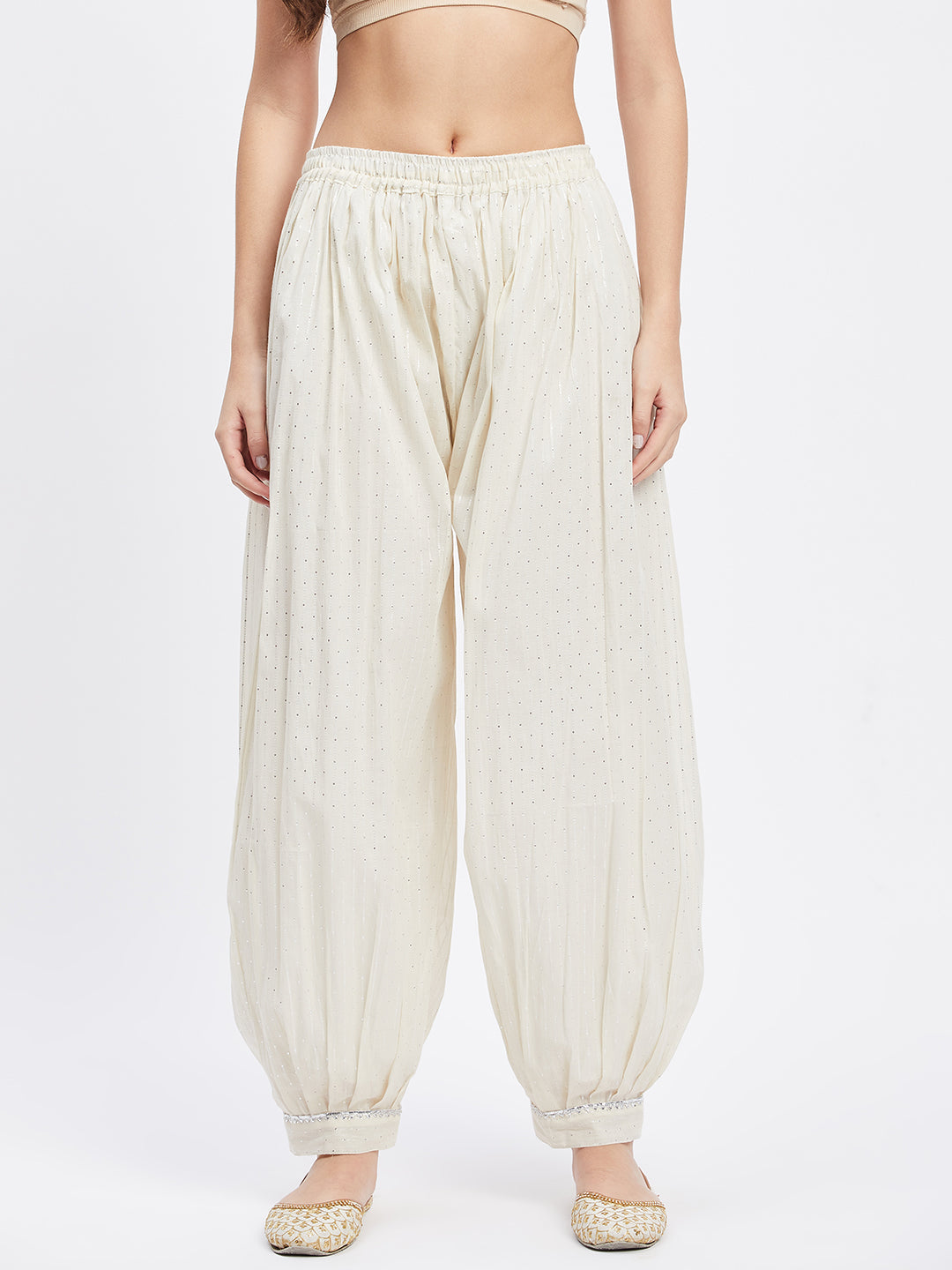 Off-white embellished silver Afghani salwar with self design and elasticated waistband.
