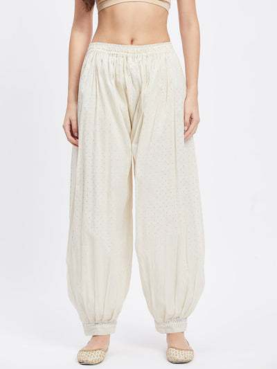 Off-white embellished silver Afghani salwar with self design and elasticated waistband.