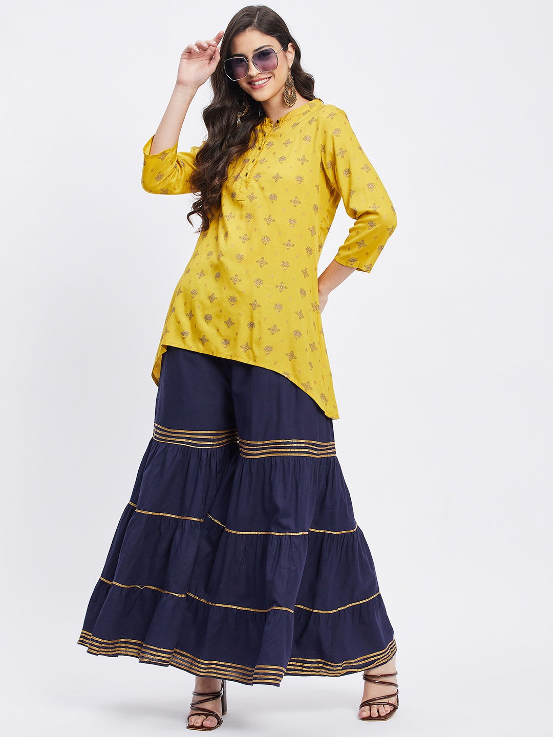 Navy blue cotton gharara with gotta patti detailing and elasticated waistband.